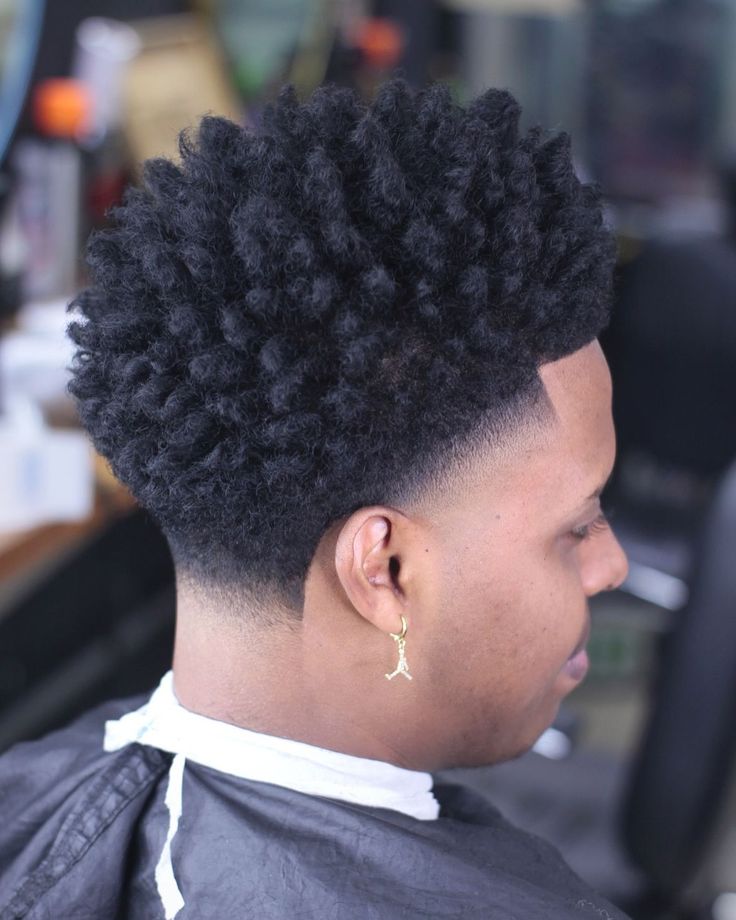 Sharp taper fade cut on a client at the barbershop